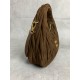 New Suede HoboP6505BC125Dark brownThis handbag reinterprets Wander's Hobo shape in suede, giving a soft and sophisticated twist to a classic vintage styleRemovable leather shoulder strapLength 110cmGold hardwareMetal monogrammed logo on frontCotton sateen