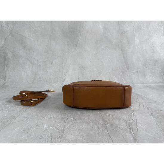 P6805BC125 Cognac soft cowhide leather with an aged effect gives the Wander a new modern elegance combining a refined silhouette with the bold experimental spirit of Miu Miu lcons Removable shoulder strap Gold-tone hardware Zipper closure Strap lining Eng