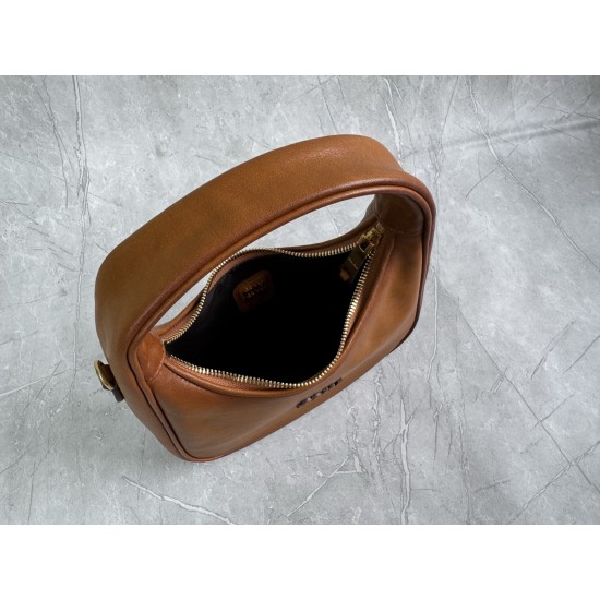 P6805BC125 Cognac soft cowhide leather with an aged effect gives the Wander a new modern elegance combining a refined silhouette with the bold experimental spirit of Miu Miu lcons Removable shoulder strap Gold-tone hardware Zipper closure Strap lining Eng