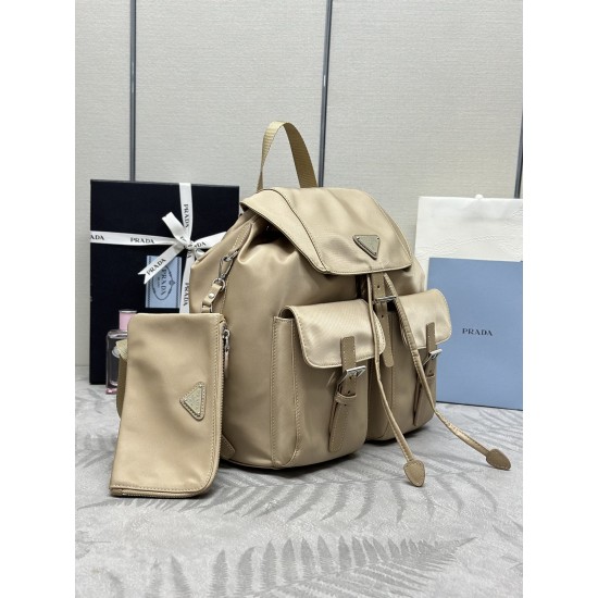 F480 with a full set of the right version of the counter packaging exclusive customized classic large backpack 1BZ811 milk tea color this nylon shoulder bag with exquisite Saffiano leather trim fusion of materials and decorated with triangular logo highli