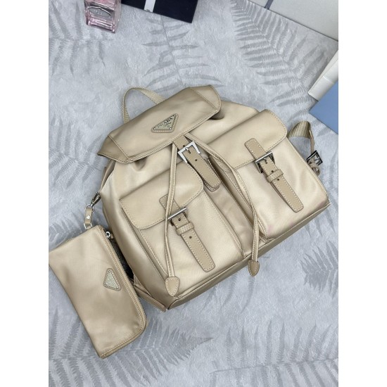 F480 with a full set of the right version of the counter packaging exclusive customized classic large backpack 1BZ811 milk tea color this nylon shoulder bag with exquisite Saffiano leather trim fusion of materials and decorated with triangular logo highli