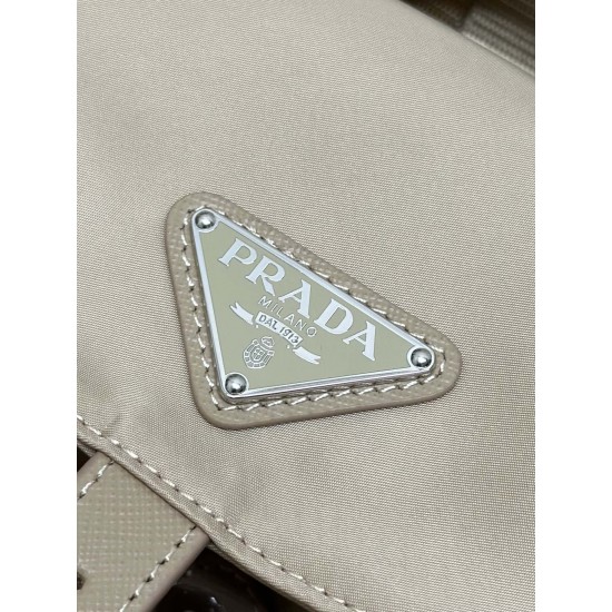 F480 with a full set of the right version of the counter packaging exclusive customized classic large backpack 1BZ811 milk tea color this nylon shoulder bag with exquisite Saffiano leather trim fusion of materials and decorated with triangular logo highli