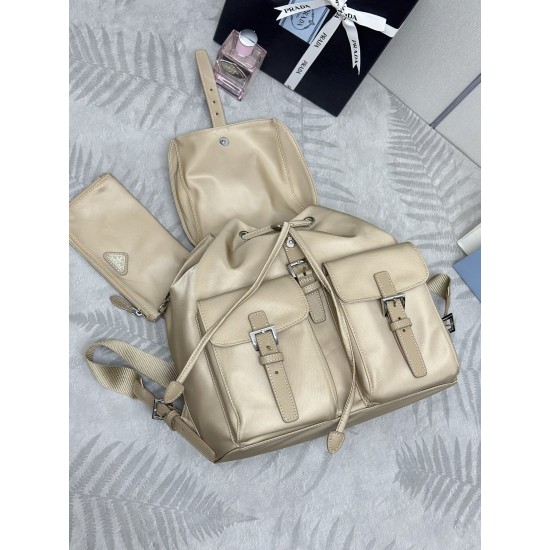 F480 with a full set of the right version of the counter packaging exclusive customized classic large backpack 1BZ811 milk tea color this nylon shoulder bag with exquisite Saffiano leather trim fusion of materials and decorated with triangular logo highli