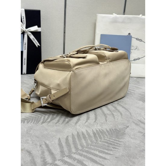 F480 with a full set of the right version of the counter packaging exclusive customized classic large backpack 1BZ811 milk tea color this nylon shoulder bag with exquisite Saffiano leather trim fusion of materials and decorated with triangular logo highli