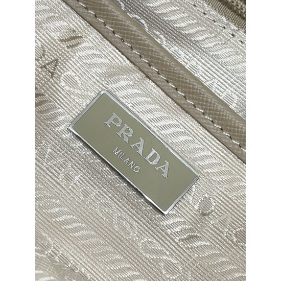 F480 with a full set of the right version of the counter packaging exclusive customized classic large backpack 1BZ811 milk tea color this nylon shoulder bag with exquisite Saffiano leather trim fusion of materials and decorated with triangular logo highli