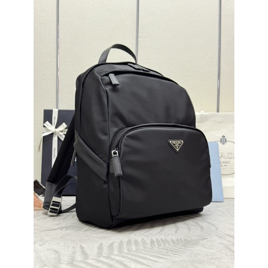 F500 classic pop-up duffel bag 2VZ104 triangular standard goods nylon material adjustable straps back fabric Saffiano leather carry handle zipper closure two zipper outer pockets nylon lining one zipper inner pocket and one pocket sewn to the interior wal