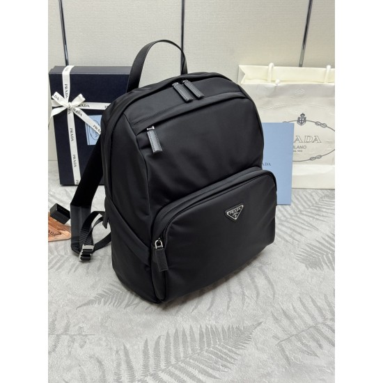 F500 classic pop-up duffel bag 2VZ104 triangular standard goods nylon material adjustable straps back fabric Saffiano leather carry handle zipper closure two zipper outer pockets nylon lining one zipper inner pocket and one pocket sewn to the interior wal