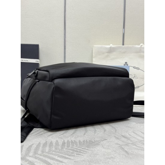 F500 classic pop-up duffel bag 2VZ104 triangular standard goods nylon material adjustable straps back fabric Saffiano leather carry handle zipper closure two zipper outer pockets nylon lining one zipper inner pocket and one pocket sewn to the interior wal