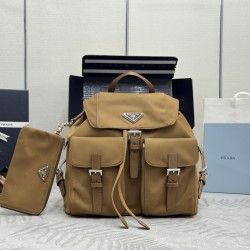 F480 with a full set of the right version of the counter packaging exclusive customized classic large backpack 1BZ811 nylon shoulder bag with exquisite Saffiano leather trim fusion of materials and decorated with triangular logo highlights the charm of fa