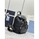 F610 with the counter version of the full set of packaging exclusive customized new backpack 1BZ074 this backpack combines several elements of imported nylon fabric and shiny cowhide leather top metal hardware accessories elegant and versatile with the ou