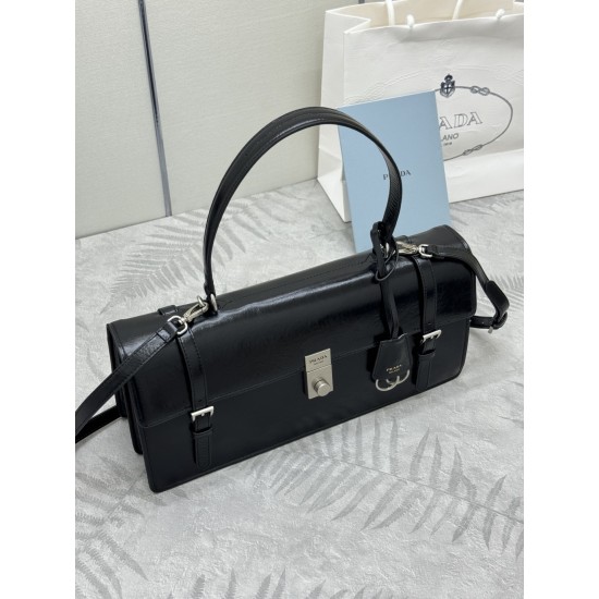 F850202525ss new pencil bag 1BN024 large this leather handbag inspired by the quite formal briefcase texture delicate glossy with a new attitude to re-interpret the classic office style silhouette using delicate soft detailing for the bag's classic shape 