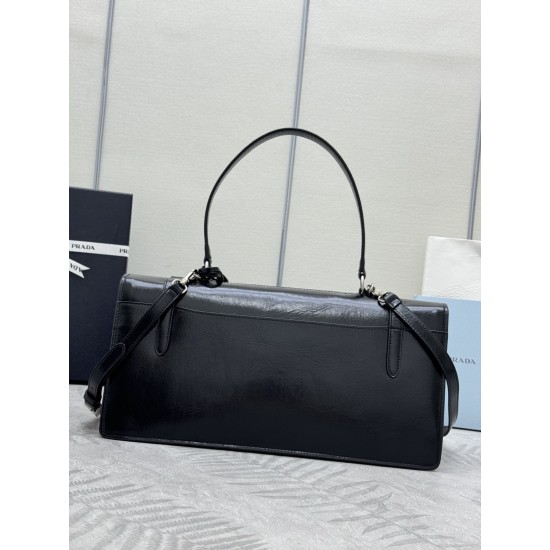 F850202525ss new pencil bag 1BN024 large this leather handbag inspired by the quite formal briefcase texture delicate glossy with a new attitude to re-interpret the classic office style silhouette using delicate soft detailing for the bag's classic shape 